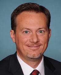 Official portrait of Michael Cloud