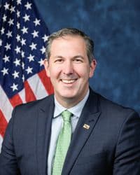 Official portrait of Johnny Olszewski