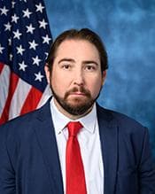 Official portrait of Elijah Crane