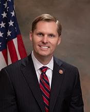Official portrait of Michael Guest