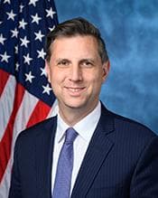 Official portrait of Seth Magaziner
