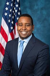 Official portrait of Joe Neguse